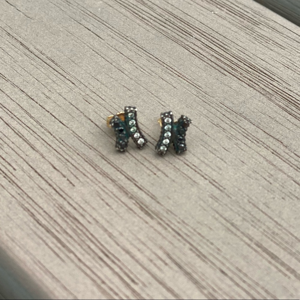 Black & white diamond rhodium & 14k gold studs.
